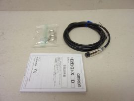Omron E2E-X8MD1 2m induktív szenzor, közelítéskapcsoló, 2m kábellel, 10-30VDC, 0...8mm érzékelés, NO (alaphelyzetben nyitott), 100 mA, M12 menet, IP67, 0.8kHz, nikkelezett sárgaréz ház, 2 vezetékes, síkba nem építhető, LED visszajelzés