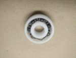   629 KGK AKN, 9x26x8 mm, mindkét oldalt nyitott egysoros mélyhornyú xiros® B180 golyóscsapágy, poliamid kosárral, és üveg golyókkal (IGUS BB-629-B180-10-GL)