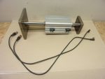   Aventics R404064500, KHZ-DA-063-0100-M-MODI, kettős működésű pneumatikus munkahenger, dugattyú Ø 63mm, lökethossz 100mm, 10 bar, 2db. 0830100486 szenzorral + kábellel, és lineáris modullal